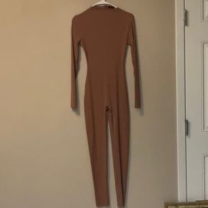 Naked Wardrobe bodysuit, size Large, color is Coco, like new